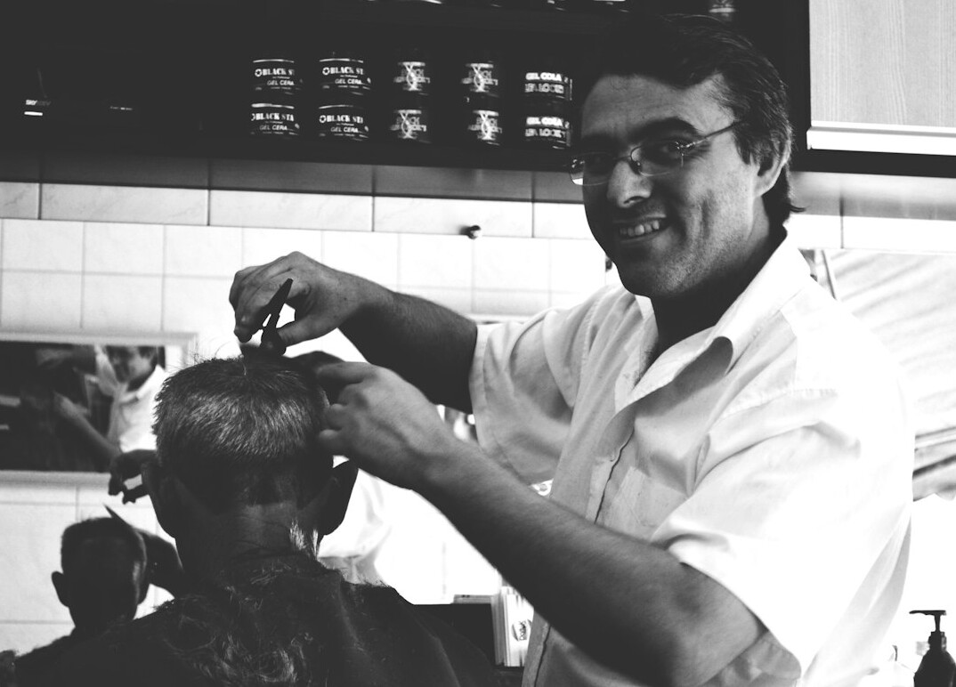 Brazilian man facilitator with glasses in a professional setting