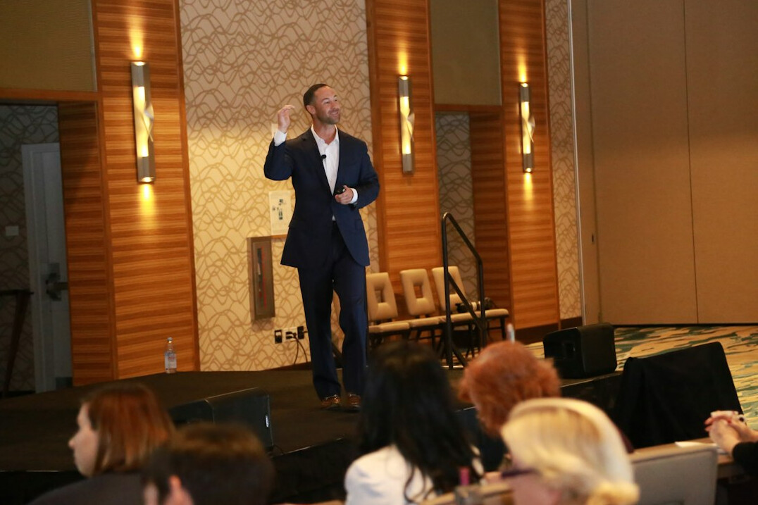 person speaking on stage